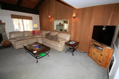 a living room with a couch and a flat screen tv at Horizons 4 140 1 Bedroom Loft 1 Bath in Mammoth Lakes