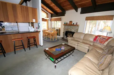 a living room with a couch and a table at Horizons 4 140 1 Bedroom Loft 1 Bath in Mammoth Lakes