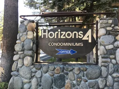 a sign for a hortonias dominolis office at Horizons 4 140 1 Bedroom Loft 1 Bath in Mammoth Lakes