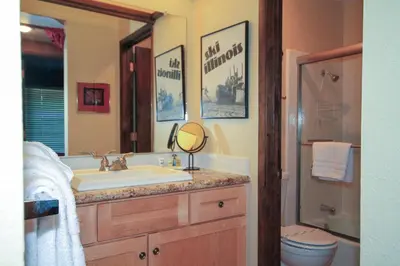 a bathroom with a sink and a mirror at Discovery 4 142 Loft in Mammoth Lakes