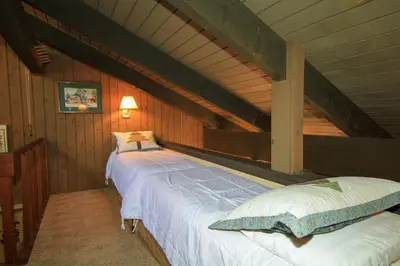 a bedroom with two beds in a attic at Discovery 4 142 Loft in Mammoth Lakes