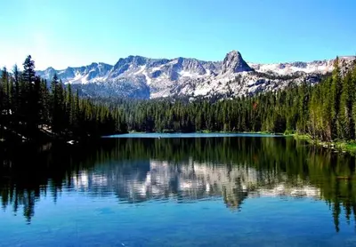 a large lake with a mountain in the background at Crestview 17 in Mammoth Lakes