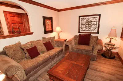 a living room with a couch and two chairs at Mammoth Ski Racquet Club 34 in Mammoth Lakes