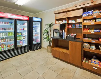 a store with two refrigerators in a grocery store at Candlewood Suites Turlock by IHG in Turlock