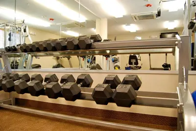 a row of weights on a machine in a laboratory at Candlewood Suites Turlock by IHG in Turlock