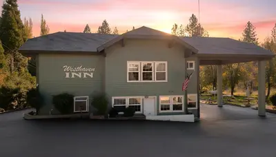 a house with a inn sign on the side of it at Westhaven Inn Pollock Pines Camino in Pollock Pines