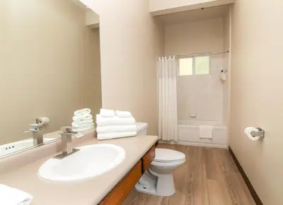 a bathroom with a sink and a toilet at Westhaven Inn Pollock Pines Camino in Pollock Pines