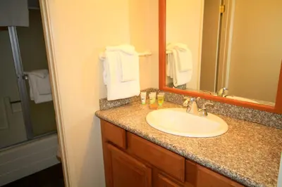 a bathroom with a sink and a mirror at Crestview 63 in Mammoth Lakes