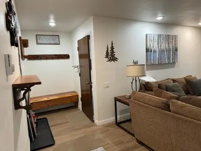 a living room with a couch and a table at Horizons 4 169 2 Bedroom 2 Bath in Mammoth Lakes