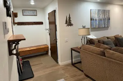 a living room with a couch and a table at Horizons 4 169 2 Bedroom 2 Bath in Mammoth Lakes