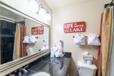 a bathroom with a sink and a mirror at Granlibakken Tahoe in Tahoe City