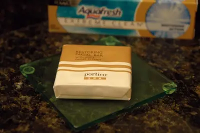 a piece of soap sitting on a green plate at Hyatt Place Reno/Tahoe Airport in Reno