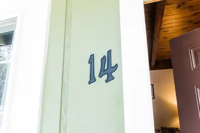 a house number on the side of a door at The Washoe Lodge in South Lake Tahoe