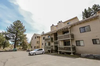 a car parked in front of a building at La Vista Blanc #61 Condo in Mammoth Lakes