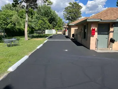 an empty street in front of a building at Bishop Elms Motel in Bishop