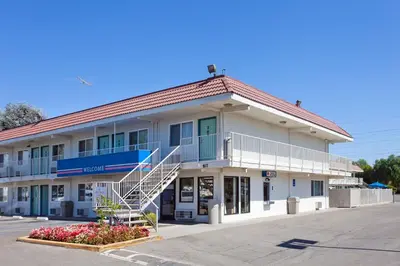 a building with a staircase in front of it at Motel 6-Stockton, CA - Charter Way West in Stockton