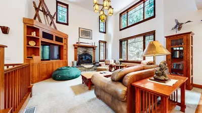 a living room with a couch and a fireplace at Timbers 5 4-Bedroom Townhouse Townhouse in Mammoth Lakes
