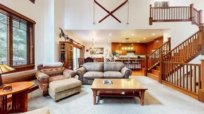 a living room with a couch and a table at Timbers 5 4-Bedroom Townhouse Townhouse in Mammoth Lakes