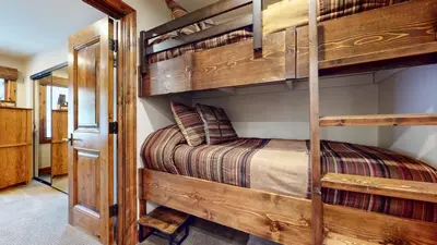 a couple of bunk beds in a room at Snowcreek 269 Condo in Mammoth Lakes