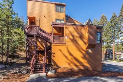 a house with a staircase leading up to it at Courchevel 14 Condo in Mammoth Lakes