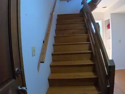 a staircase in a house with wooden steps at Rr-edgewater08 in June Lake