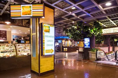 a store with a sign in the middle of a mall at Eldorado Reno, A Caesars Destination in Reno