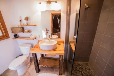 a bathroom with a sink and a toilet and a shower at Cottage Inn At Lake Tahoe in Tahoe City