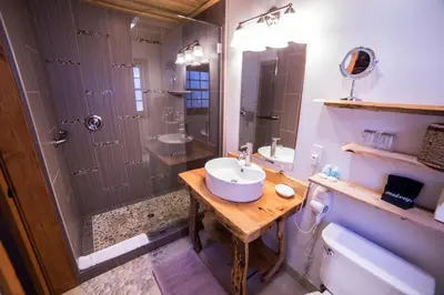 a bathroom with a sink and a shower at Cottage Inn At Lake Tahoe in Tahoe City