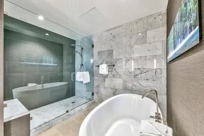 a bathroom with a tub and a sink and a bath tub at Zalanta 328 - HVH3 in South Lake Tahoe