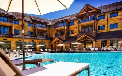 a view of the pool at a resort with tables and umbrellas at Zalanta 328 - HVH3 in South Lake Tahoe