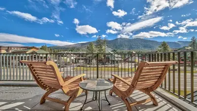 a patio with two chairs and a table on a balcony at Zalanta 325 in South Lake Tahoe