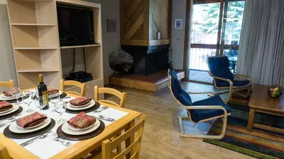 a living room with a table with food on it at Gold Bend 5022 in Truckee