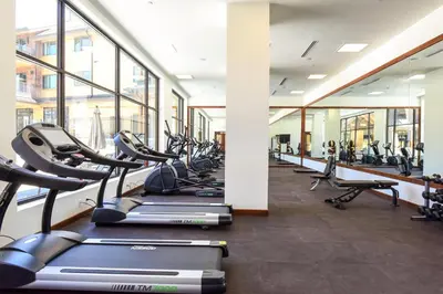 a gym with a row of treadmills and machines at Zalanta 221 in South Lake Tahoe
