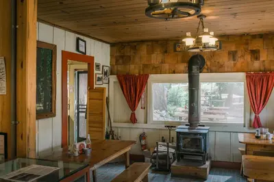 a kitchen with a wood stove in a room at Silver City Mountain Resort in Sequoia National Park