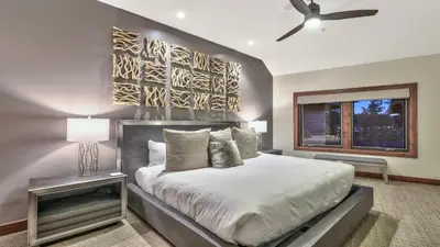 a bedroom with a bed and a ceiling fan at Zalanta 313 in South Lake Tahoe