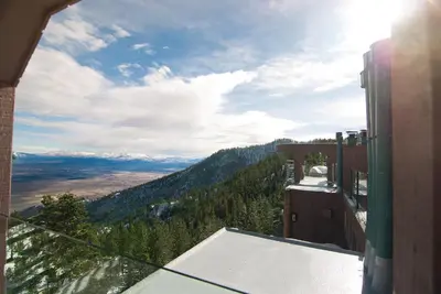a view of the mountains from the balcony of a building at The Ridge Sierra in Stateline