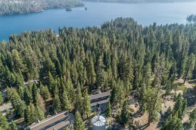 an aerial view of a forest with a building at Eagles Nest Condo #88 in Lakeshore