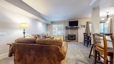 a living room with a couch and a table at Horizons 4 #165 Condo in Mammoth Lakes