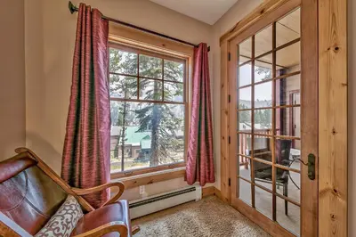 a living room with a couch and a window at R110 Timber Ridge in Kirkwood