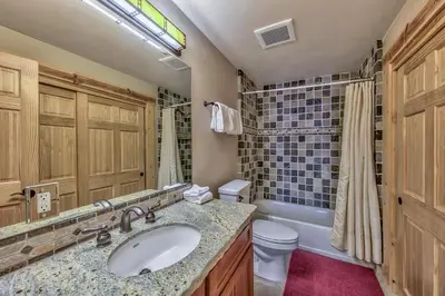 a bathroom with a sink and a toilet at R101 Timber Ridge in Kirkwood