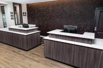a lobby with two reception desks in a building at Residence Inn by Marriott Rocklin Roseville in Roseville