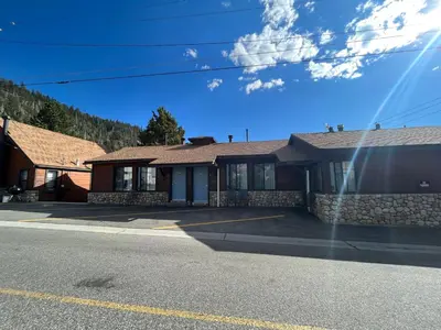 a house on the side of the street at June Lake Villager in June Lake