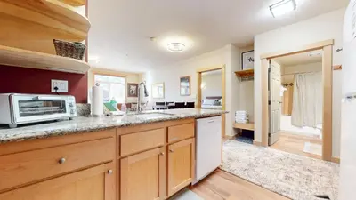 a kitchen with a counter top and a microwave at Sunstone #126 Condo in Mammoth Lakes