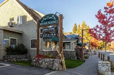 a sign in front of a building at Mother Nature's Inn in Tahoe City