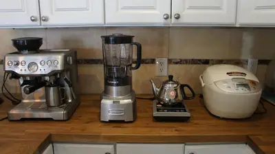a blender and a coffee maker on a counter at Paradice Motel in South Lake Tahoe
