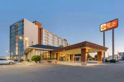 a hotel with a sign in front of a building at Best Western Plus Sparks-Reno Hotel in Reno