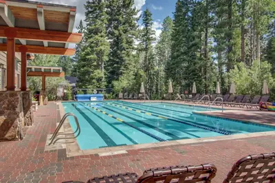 a large swimming pool with blue water at Silver Star Retreat in Ponderosa Fairway Estates