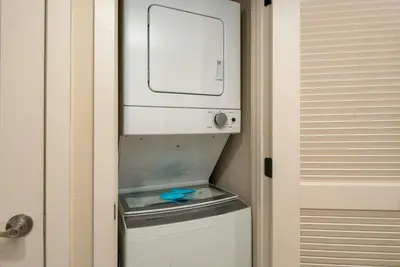 a small refrigerator with its door open in a room at WorldMark Angels Camp in Angels Camp