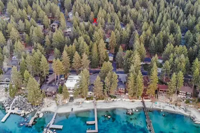 an aerial view of a resort with trees at Skyland Retreat - Max nighttime occupancy of 8 in Zephyr Cove