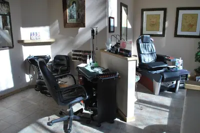 a hair salon with a chair and a desk at Double Eagle Resort and Spa in June Lake